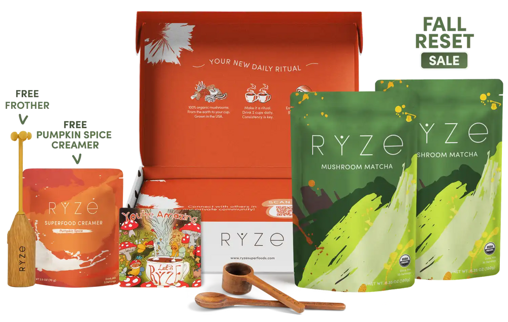 A RYZE fall seasonal gift box set featuring an orange inner box, two green mushroom matcha pouches, an orange creamer pouch, a small spice creamer packet, wooden measuring tools, and promotional text reading 'FALL RESET SALE'.