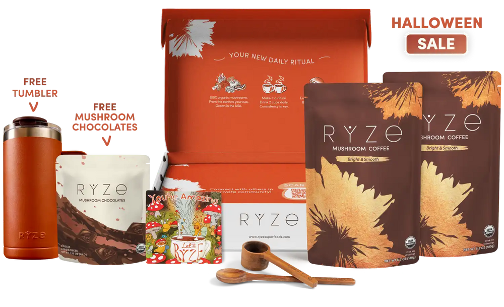 Ryze Mushroom Coffee gift set displayed on a white background, featuring an orange gift box, two brown coffee pouches, a free tumbler, a free mushroom chocolate pouch, and a small decorative box. Text on the image reads 'HALLOWEEN SALE'.